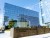 THE NEW CITY HALL grand opening, held July 29, was attended by approximately 600 people in downtown Long Beach. Mayor Robert Garcia dedicated the new civic center. The Port of Long Beach building is seen as a vivid reflection on City Hall.
