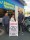 MARIO AND ARACELI Dominguez, new owners of Emmanuel Auto Repair stand with Mohamed Elbiali, owner of the newly restored ARCO gas station at Norwalk Boulevard and Wardlow Road.