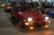 Actor and car enthusiast Sung Kang makes his way to the top of the Long Beach Aquarium parking structure in a Toyota AE86 while greeting a fan. 