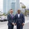 Port CEO Dr. Noel Hacegaba poses with Long Beach Mayor Rex Richardson in front of the port’s newly acquired building at 100 Oceangate.