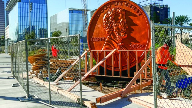 A GIANT PENNY is installed at Lincoln Park in Long Beach Monday, Feb. 7, 2022. As mayor of Long Beach, Robert Garcia helped bring the 11-foot monument to Downtown. Now, in Congress, he’s pushing the U.S. to stop minting the coins. 